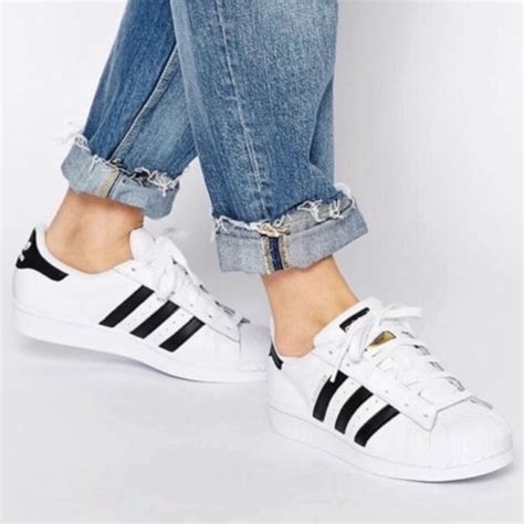 black and white adidas shoes|adidas white sneakers black stripes.